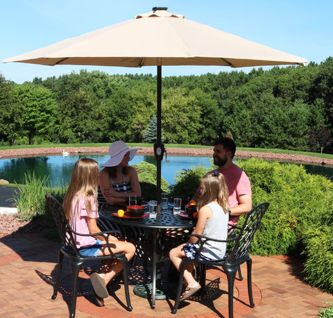 A table is a great way to prevent a patio umbrella from falling over.