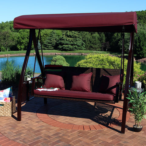 Clean outdoor furniture cushions on a 3-person patio swing