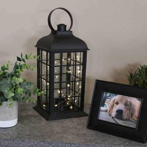 Use this battery-powered indoor lantern with LED lights to light up your room this holiday season.