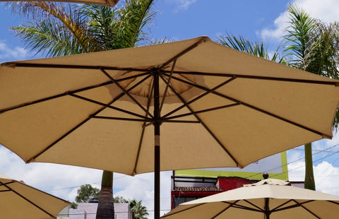 Clean outdoor umbrella fabric giving protection from the sun.