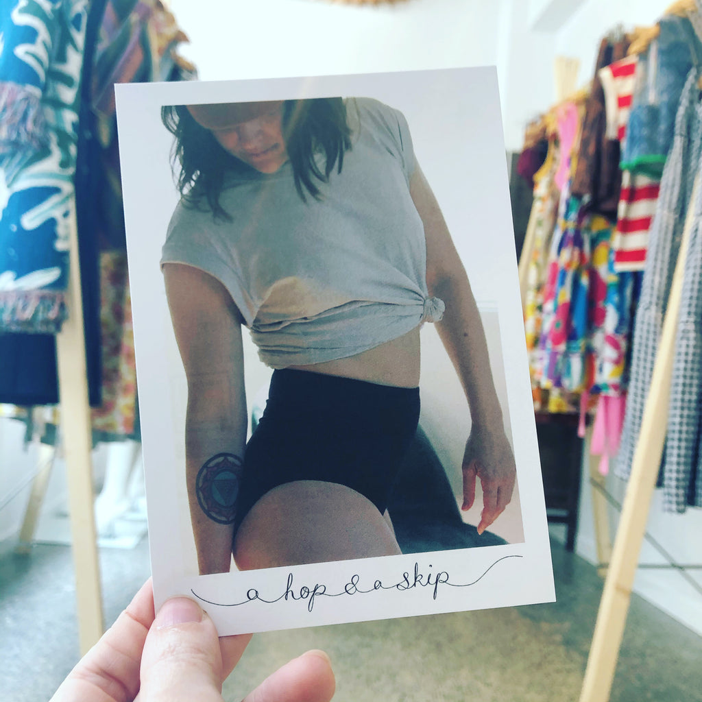 Polaroid type image of model wearing a hop and a skip range