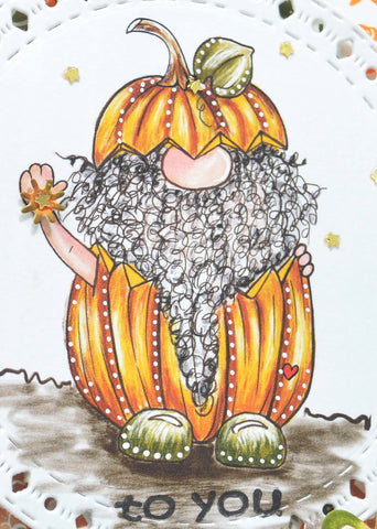 It's Jack O'Gnome free digital stamp image in all his glory closeup and friendly in his pumpking costume ready to hand you his flower.  To You.  decorated with spots and dots, he's perfect for any Halloween greeting card