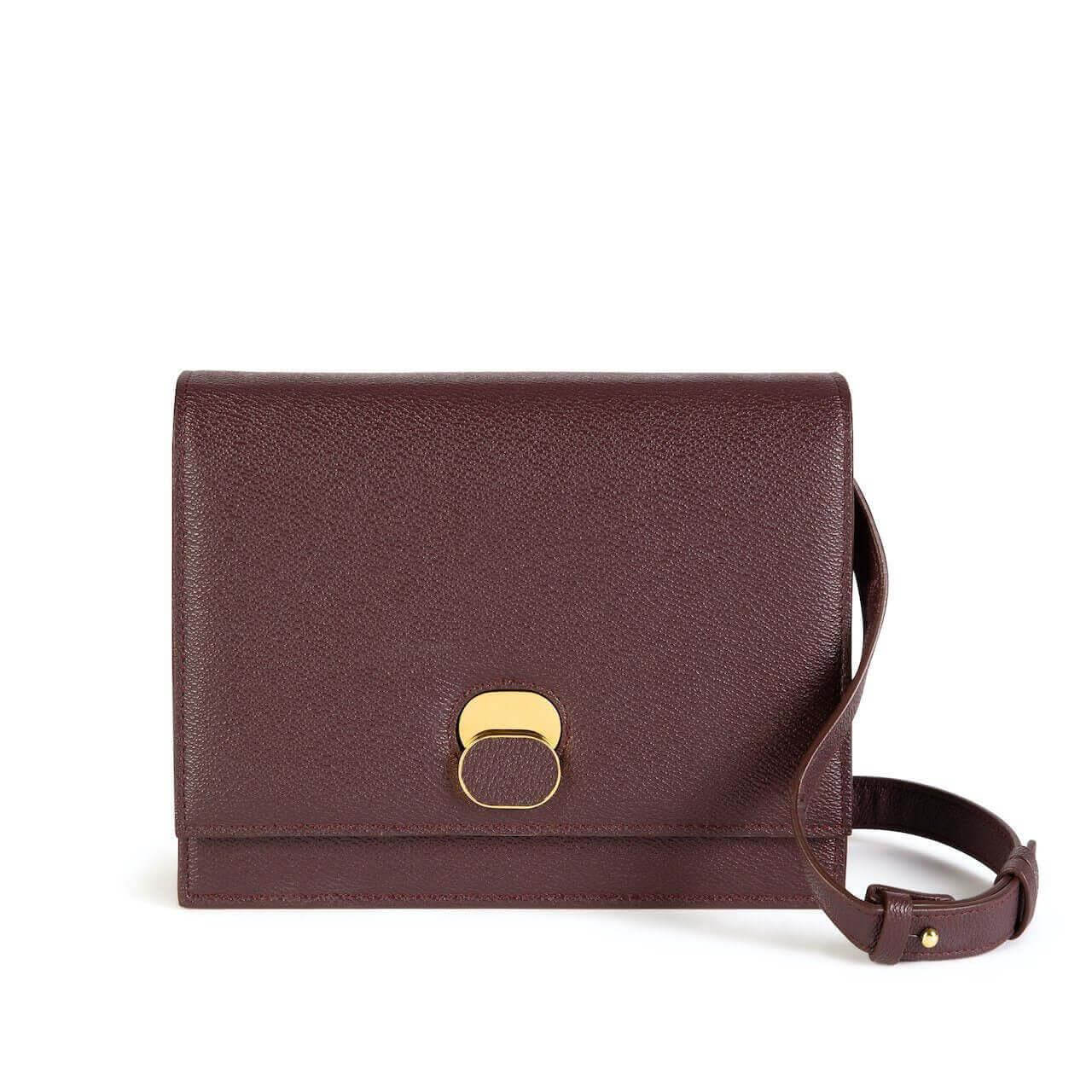 Nyx- Black Apple Leather Handbag | Vegan Leather Designer Handbag at Rs  11995.00 | Women Leather Handbags, महिलाओं का चमड़े का हैंडबैग - Living  Brown Private Limited, Mumbai | ID: 2851885199055