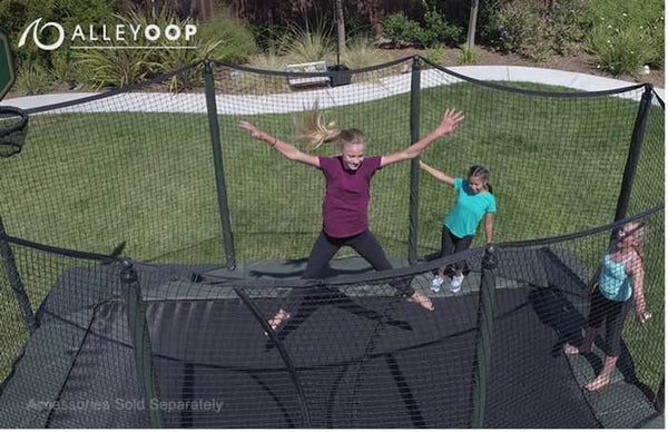 Three kids jumping on an AlleyOOP Trampoline.