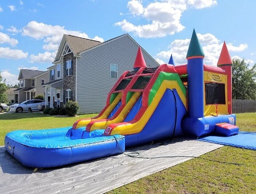 A bounce house in a backyard.