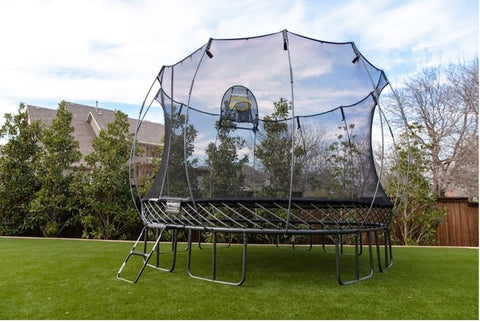 A gunmetal grey Springfree Trampoline.