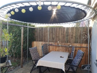 A trampoline turned into a pavilion.