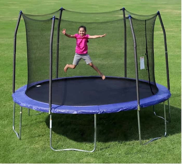 A little girl jumping in mid-air on a blue Skywalker Trampoline.