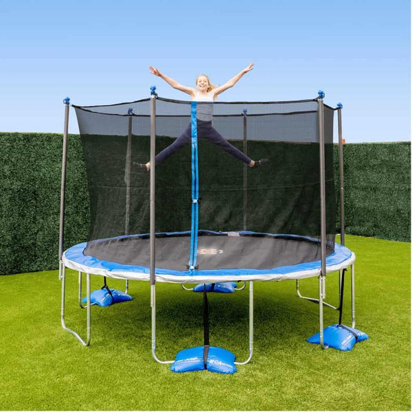 A girl jumping on a spring trampoline.