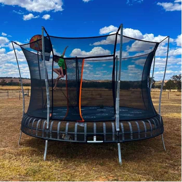 A kid jumping on the Vuly Thunder Large Trampoline.