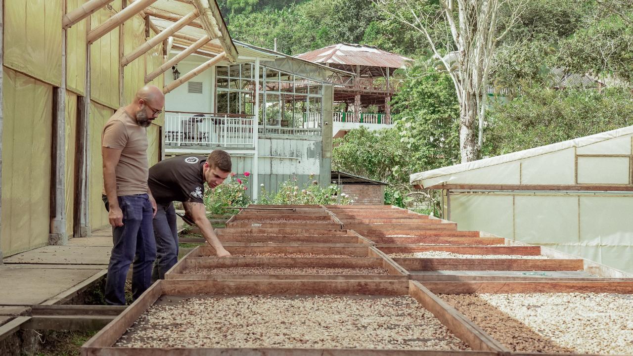 Coffee producer and roaster discussing impact of climate change on coffee