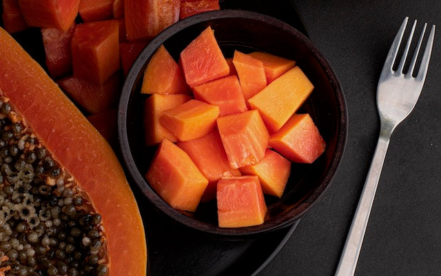 Cubes of papaya in a bowl