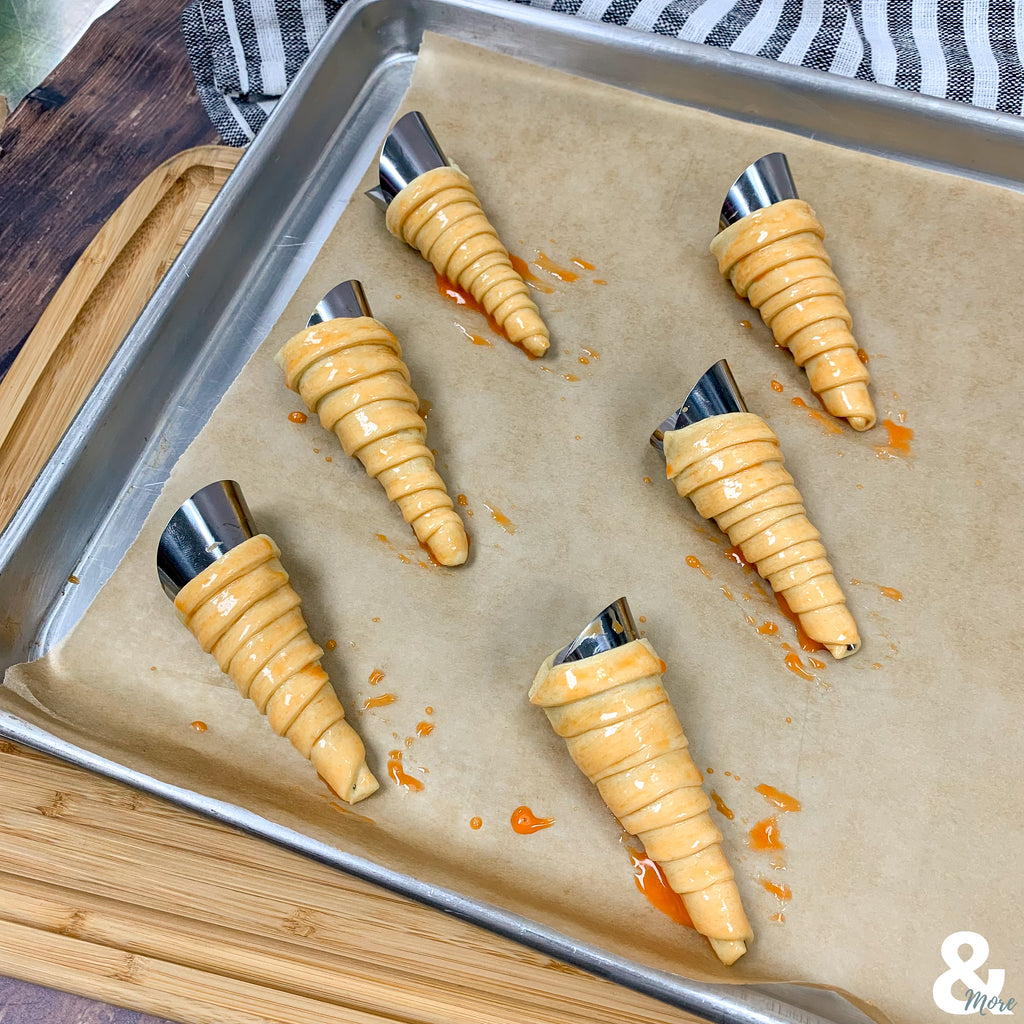 prebaked crescent carrot molds with orange colored eggwash