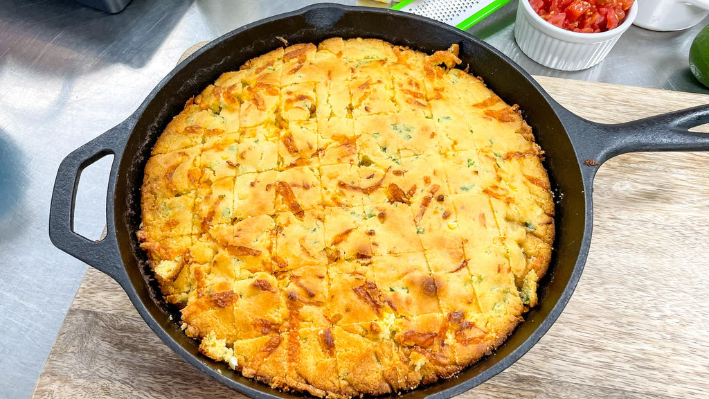 jalapeno cheddar cornbread in a cast iron skillet