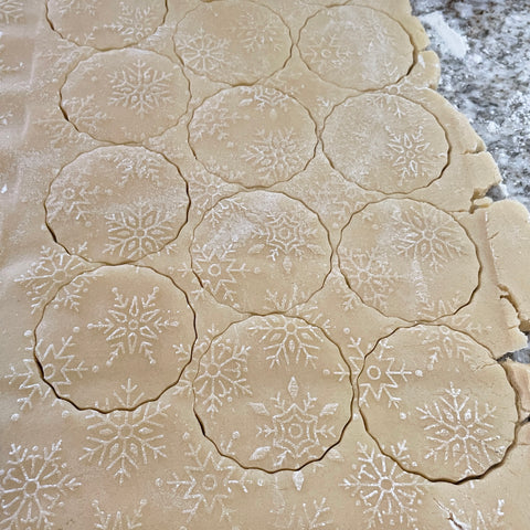 sugar cookies with an embossed snowflake design