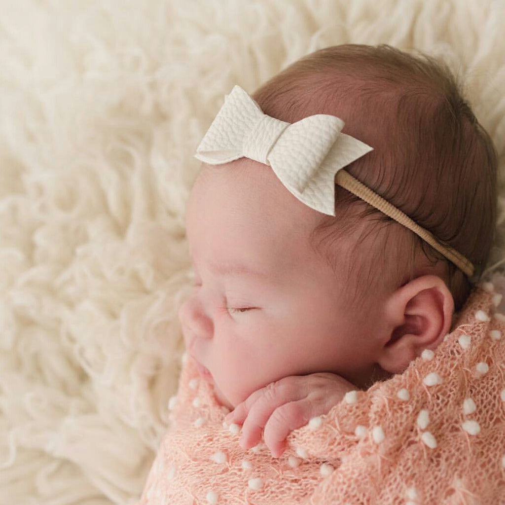 white infant headband