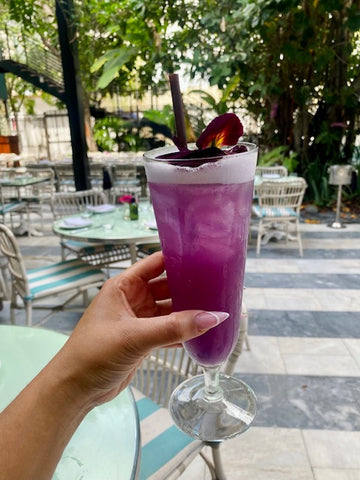 purple cocktail in a glass