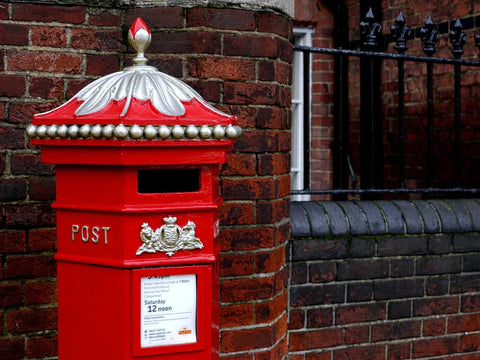 Post box covered in snow