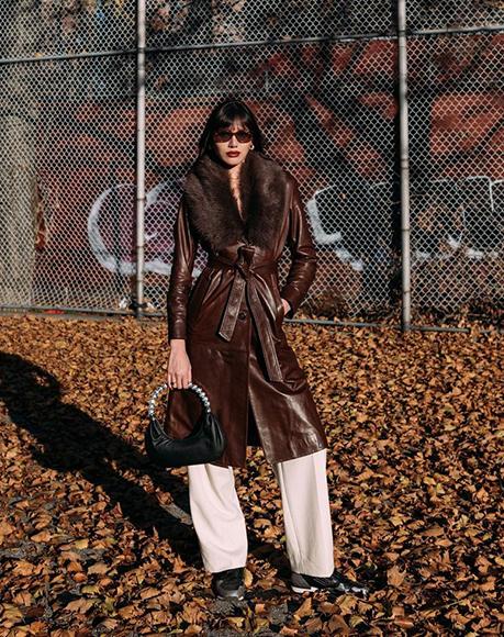 Influencer Natalie Suarez with L'alingi black leather banana bag in New York City