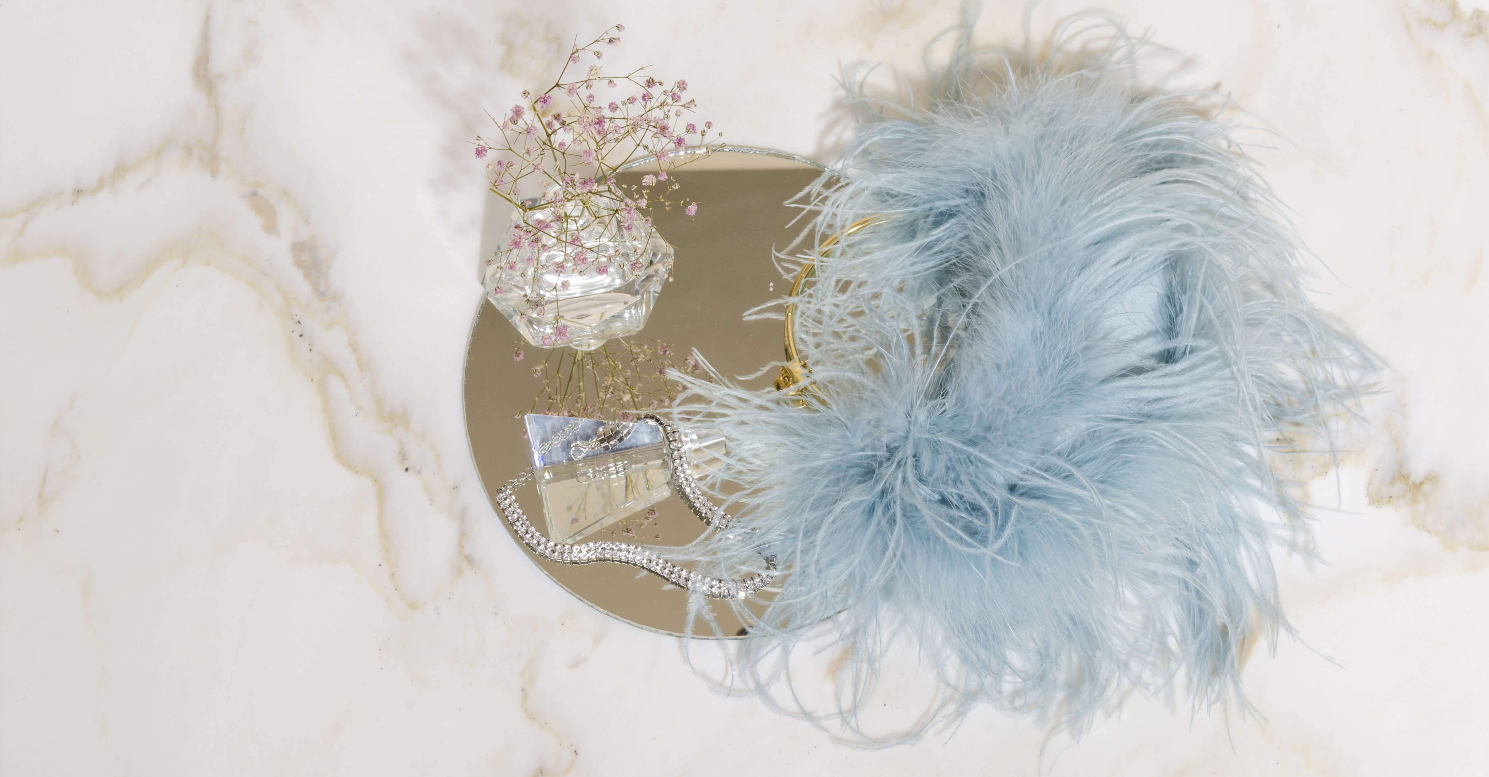 L'alingi Blue Feather Pouch