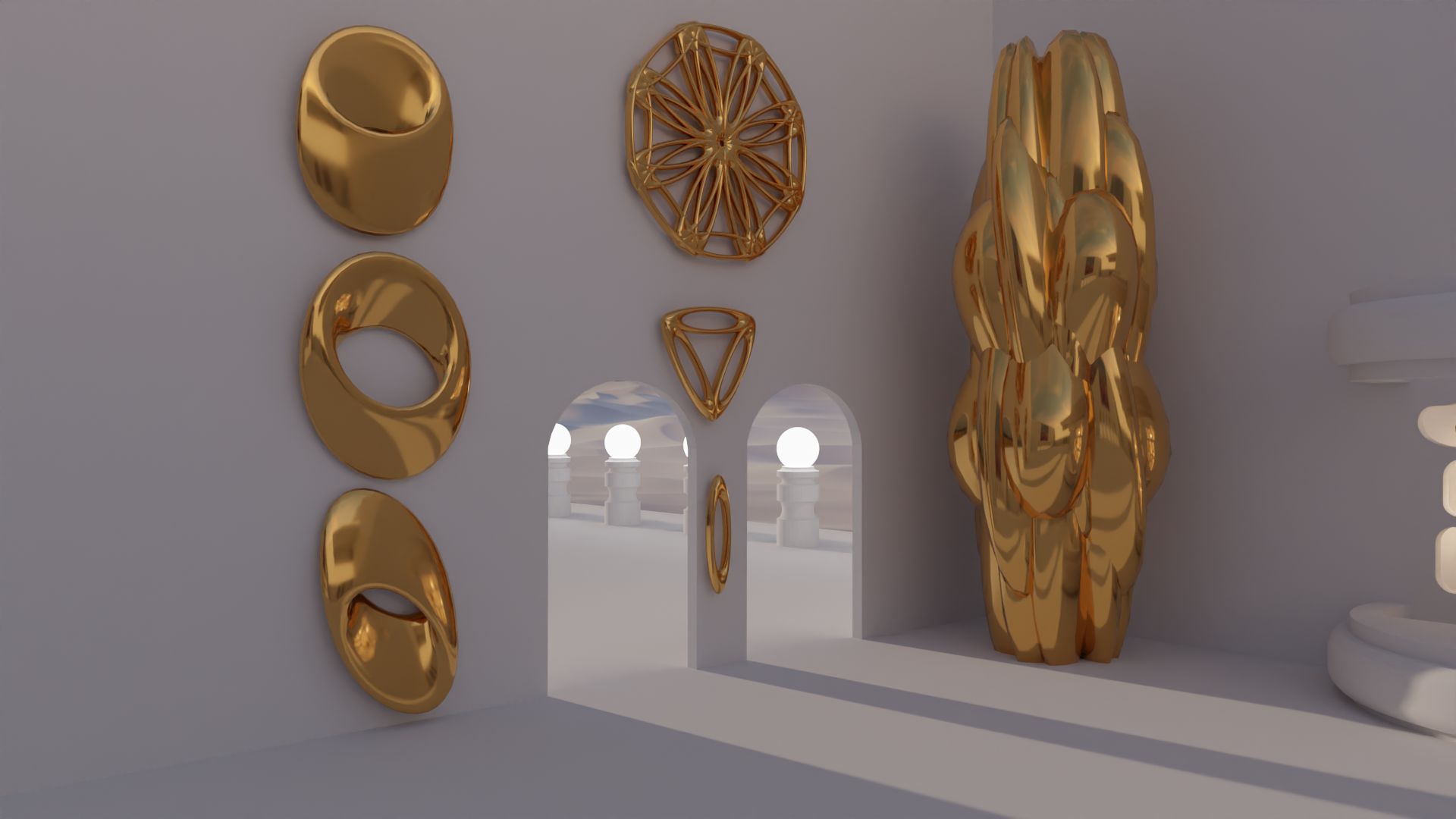 a neutral toned studio with gold sculptures on display at the entrance of two archs.