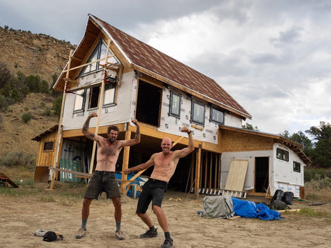 Doom and friend Brett Davis after a long day's work on the container home.