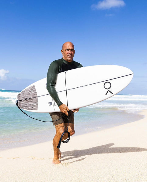 Kelly Slater with S Boss surfing