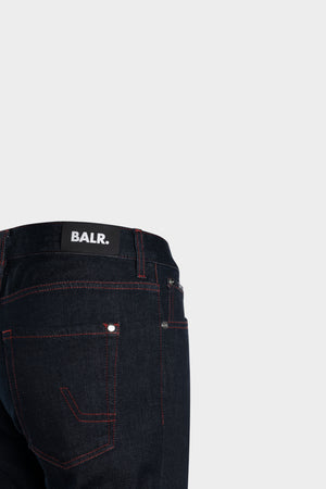 black jeans with red stitching