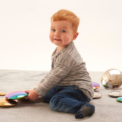 Boy with Sensory Reflective Buttons