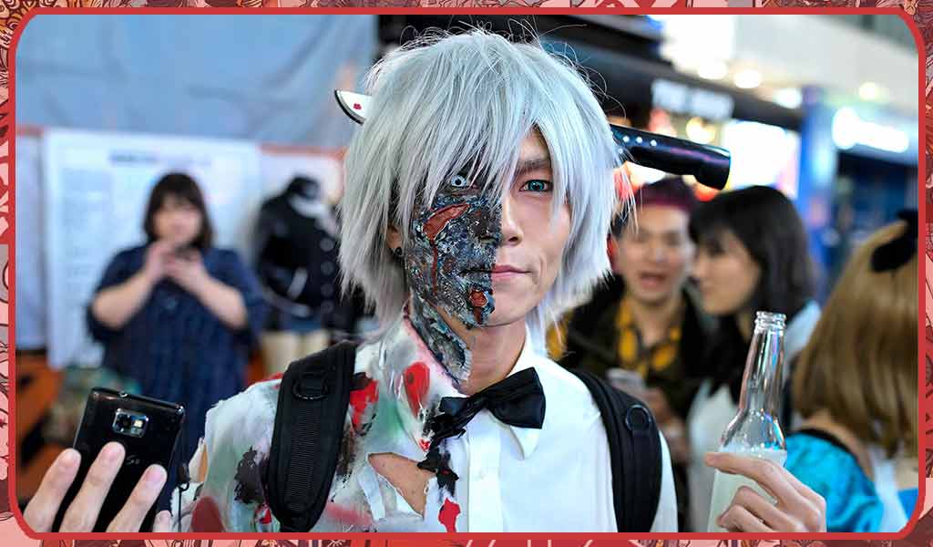 A Japanese man during Halloween Tokyo dressed as the undead