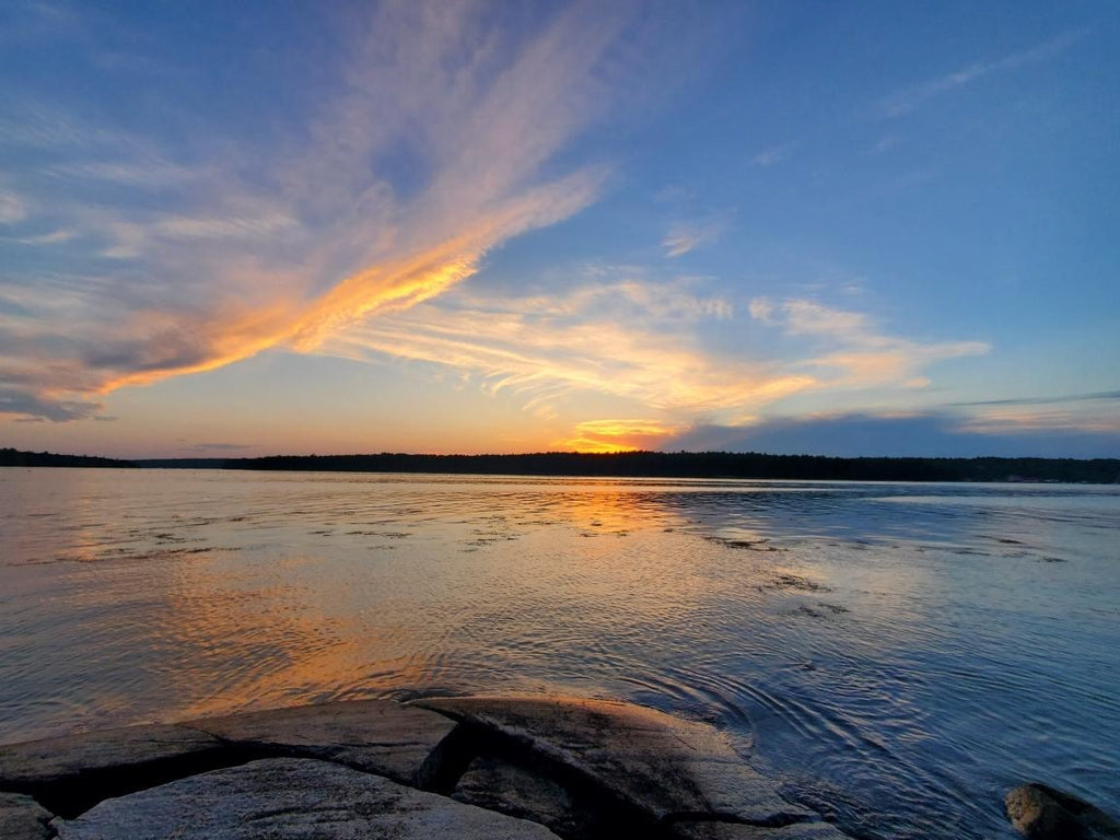 Sunrise overlooking Round Pond, Maine. Sun just peaking up over the horizon