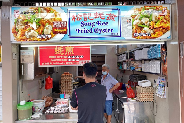 Song Kee Fried Oyster with a customer