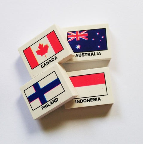 4 country erasers in total with one on top of the other.