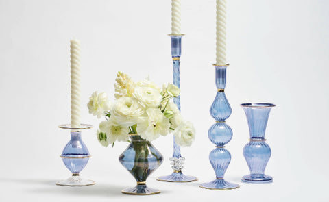 Egyptian glassware, including both Candle Holders and Vases in the color blue