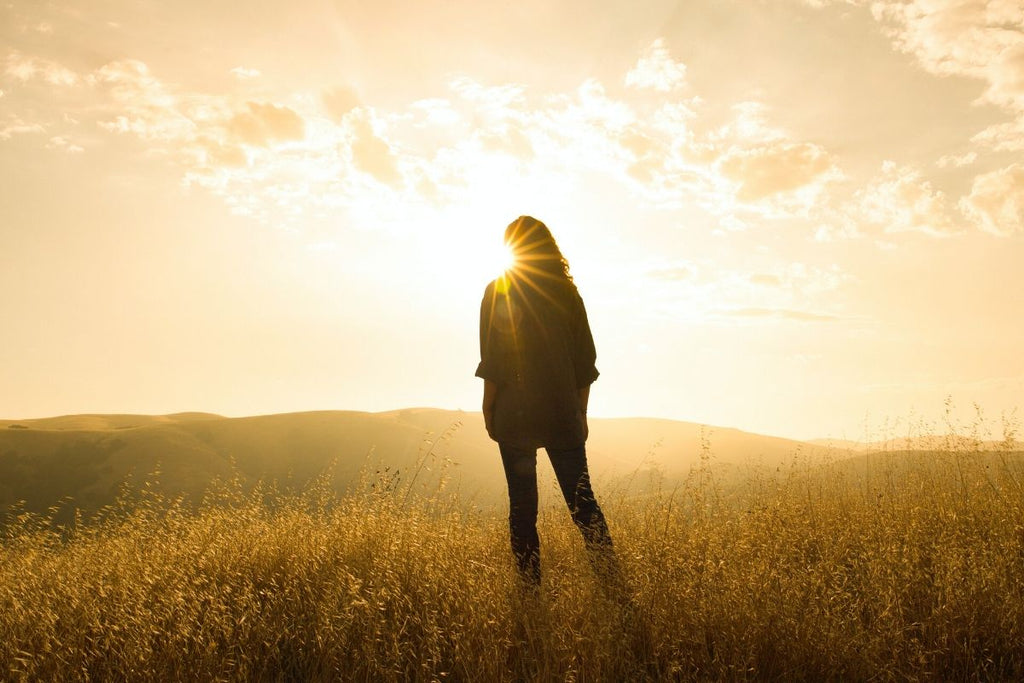 Woman standing in sun