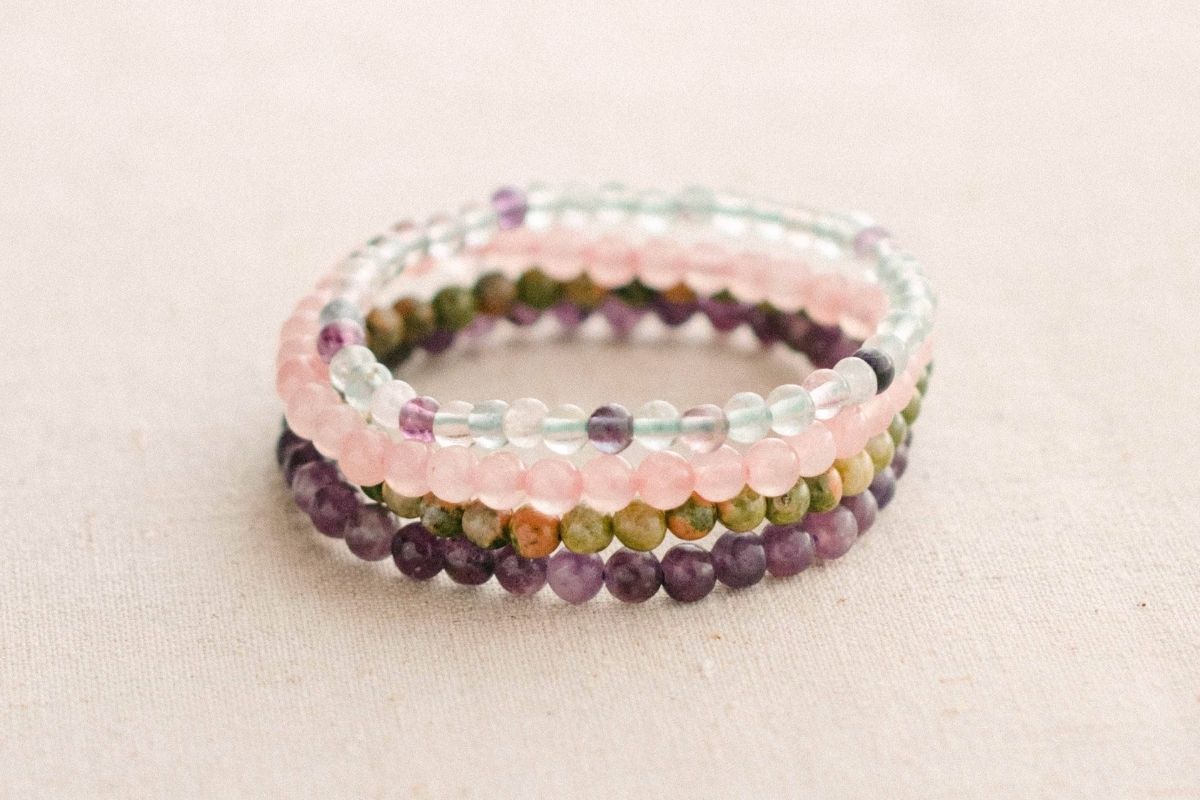 collection of fertility gemstone bracelets