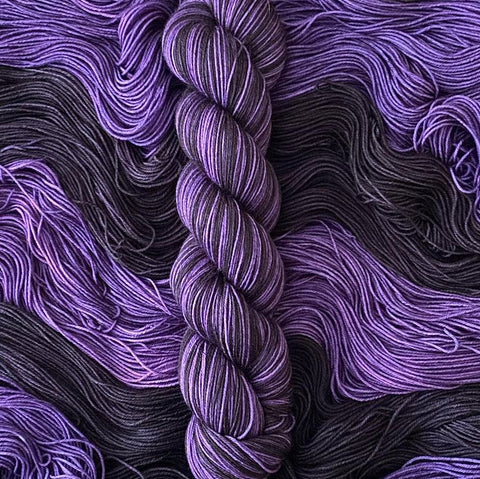 witches stockings sock black and purple striping sock yarn
