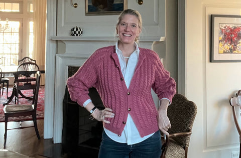 Ellen in pink cabled cardigan