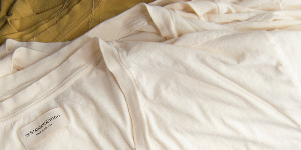 close up picture of the finished golden and bone v-neck t-shirt