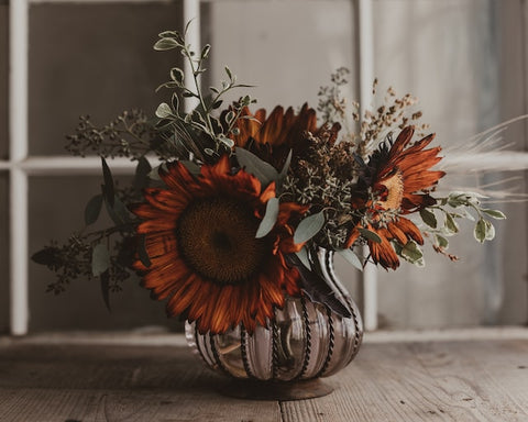 Orange sunflowers in a vase