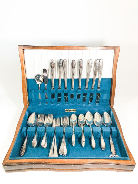WM Rogers & Son silver plate silverware flatware set in wooden tarnish resisting case with blue velvet interior by The International Silver Co, kitchenware, elegant dining collectible, silverware set, flatware set, housewarming gift