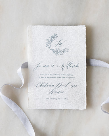 Calligraphy wedding invitation with hand made silk ribbon