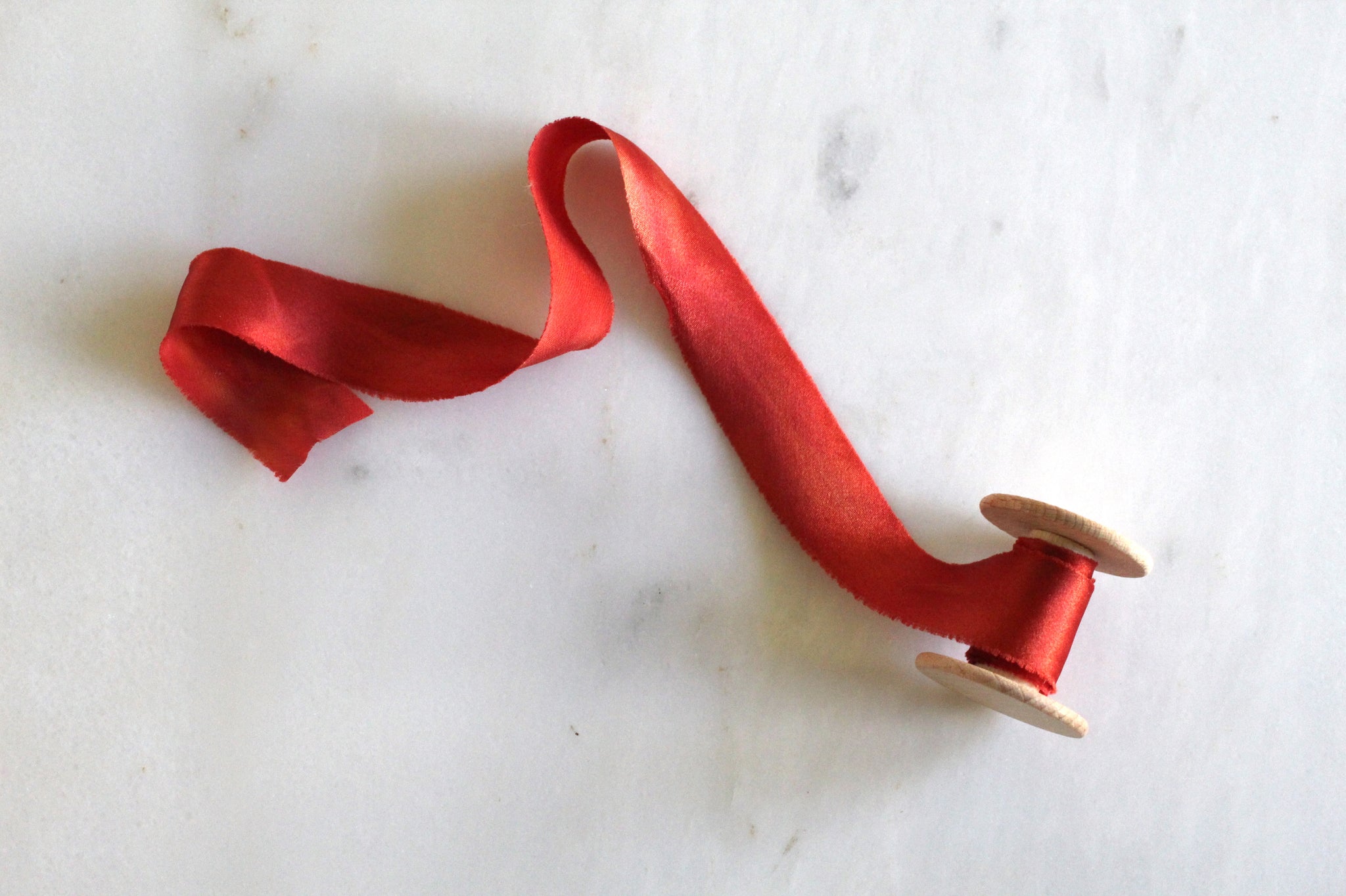 red silk ribbon