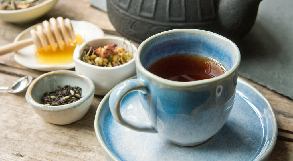 A cup of tea on a wooden table