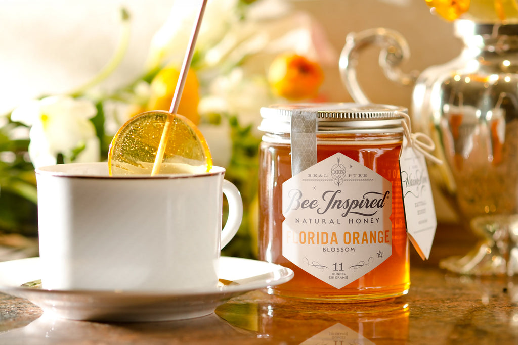 orange blossom honey with tea and lollipop