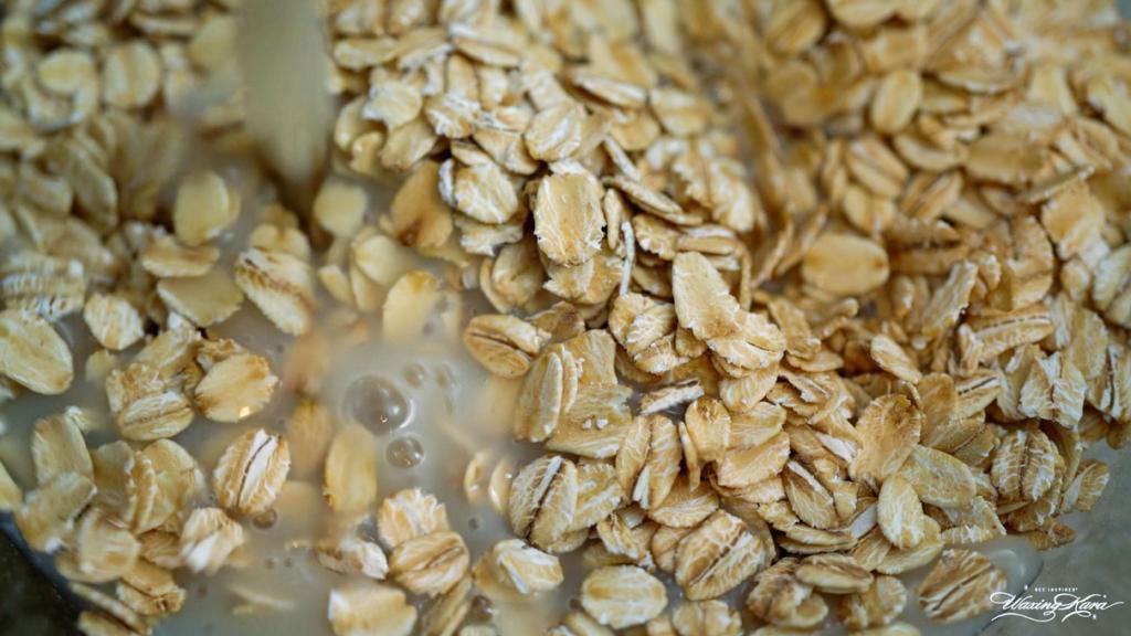 close-up of adding nut milk to oats