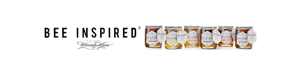 ad bee inspired with registered trademark and Bee Inspired honey jars in a row