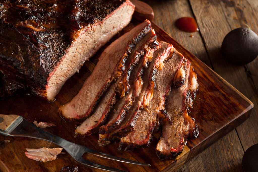 Simple Brisket Recipe with Onion, Garlic and Spices Made in the Crock Pot. Easy, Tender, Delicious.