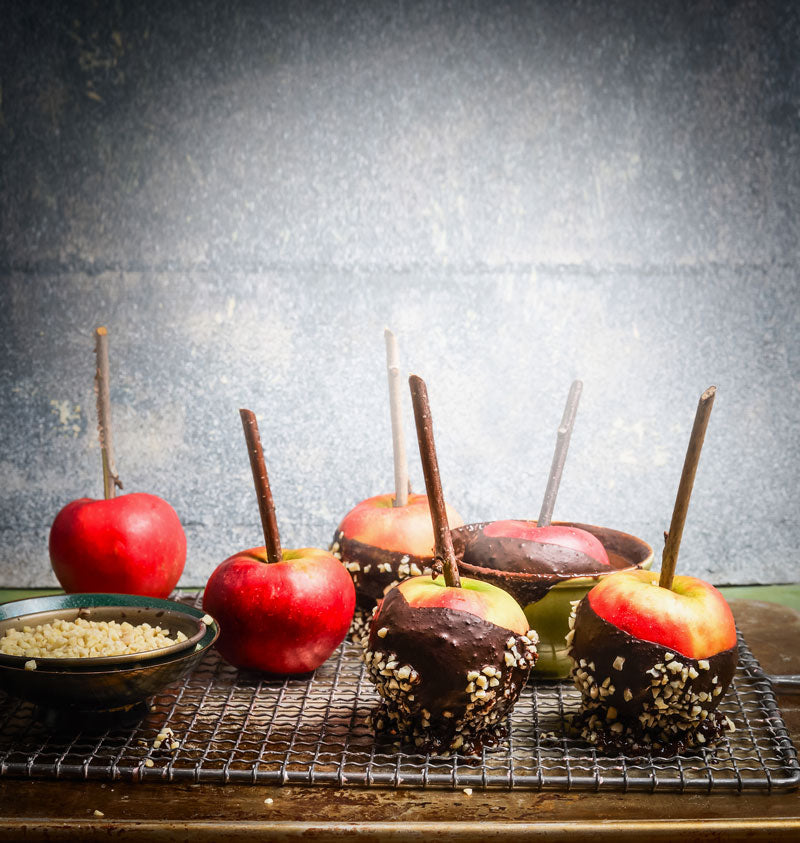 National Dessert Day recipe featuring chocolate sticky apples on grate, dipped in nuts