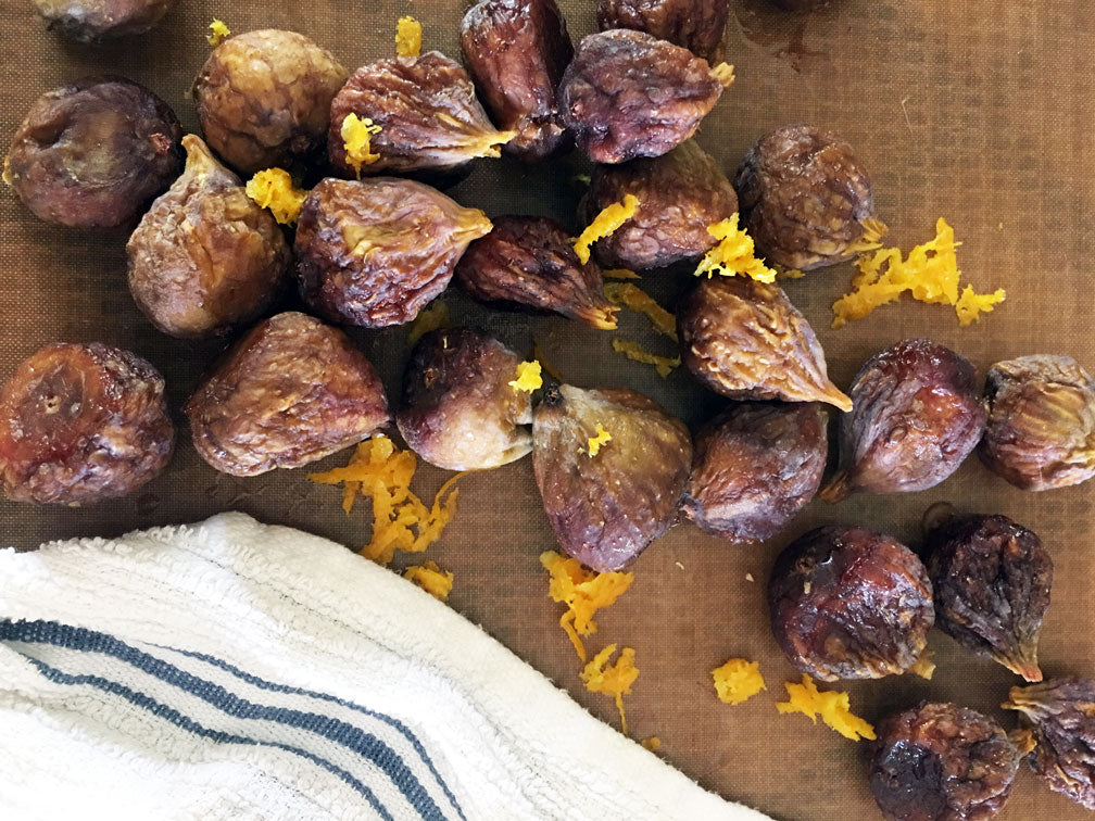 Dried figs next to a towel
